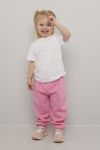 Kids World joggebukse med elastisk linning og snøring. rosa