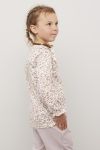Kids Clothing Aurora topp med rysjekant lyserosa.