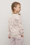 Kids Clothing Aurora topp med rysjekant lyserosa.
