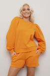 Lifetime Anna collegegenser med puffermer oransje.